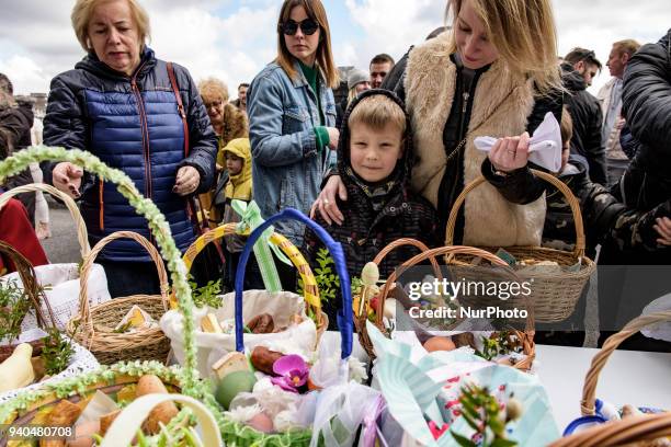 Family during the ceremony of blessing Easter basketsat The St Mary's Church, Claddagh on Saterday , March 31 in Galway, Ireland. Polish Catholics...