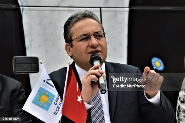 Founding member of the party, Mesut Ozarslan gestures during his speech as Turkey's opposition IYI Party holds a 'Communicate Together' event to help...