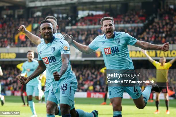 Jermain Defoe of Bournemouth scores a goal to make it 2-2 and celebrates with Marc Pugh of Bournemouth and Dan Gosling of Bournemouth during the...