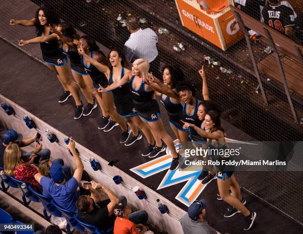 The Miami Marlins Mermaids perform during the game against the Chicago Cubs at Marlins Park on March 31, 2018 in Miami, Florida.