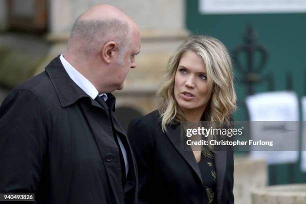 Comedian Dara O'Briain and TV Presenter Charlotte Hawkins leave Great St Mary's Church after the funeral service of British physicist, Stephen...