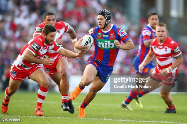 Kalyn Ponga of the Knights makes a line break during the round four NRL match between the St George Illawarra Dragons and the Newcastle Knights at...