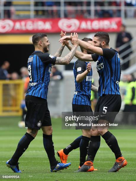 Mauro Icardi of FC Internazionale celebrates with Roberto Gagliardini after scoring the opening goal during the serie A match between FC...