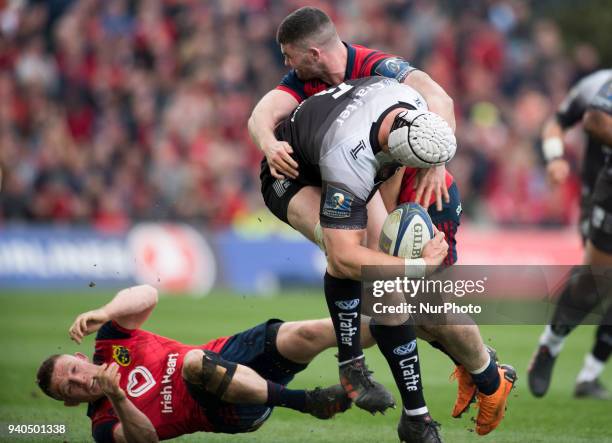 Dave Attwood of Toulon tackled by Sammy Arnold of Munster during the European Rugby Champions Cup Quarter Final match between Munster Rugby and RC...