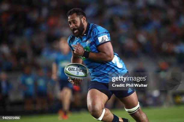 Patrick Tuipulotu of the Blues runs over to score a try during the round sevens Super Rugby match between the Blues and the Sharks at Eden park on...