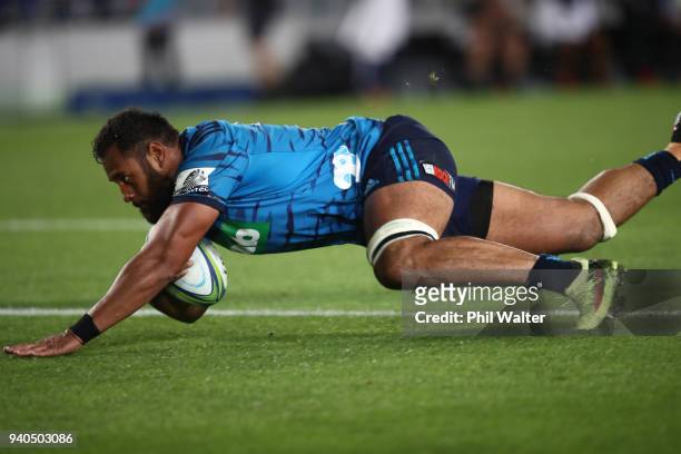 Patrick Tuipulotu of the Blues scores a try during the round sevens Super Rugby match between the Blues and the Sharks at Eden park on March 31, 2018...
