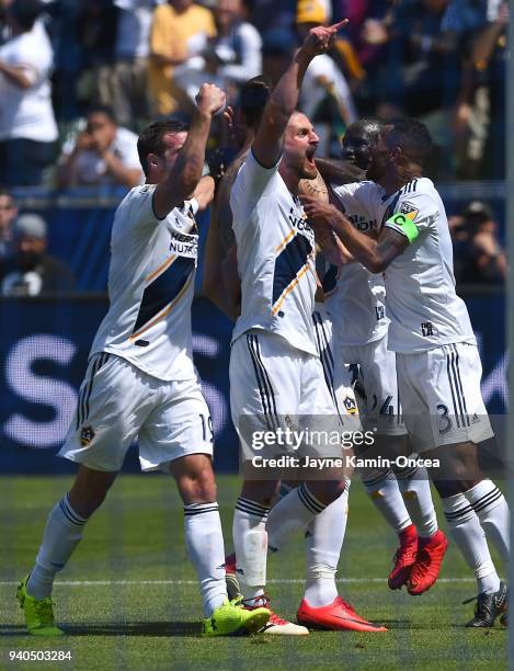 Chris Pontius, Perry Kitchen, Ema Boateng and Ashley Cole celebrate after a goal by Zlatan Ibrahimovic of Los Angeles Galaxy in the second half of...