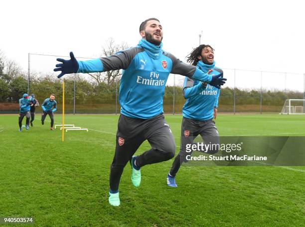 Sead Kolasinac and Mo Elneny of Arsenal during a training session at London Colney on March 31, 2018 in St Albans, England.