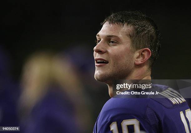 Quarterback Jake Locker of the Washington Huskies smiles on the sidelines during the game against the California Bears on December 5, 2009 at Husky...