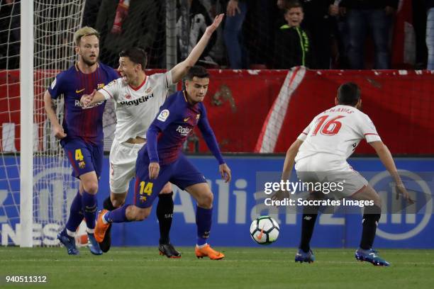 Ivan Rakitic of FC Barcelona, Clement Lenglet of Sevilla FC claims a penalty, Philippe Coutinho of FC Barcelona, Jesus Navas of Sevilla FC during the...