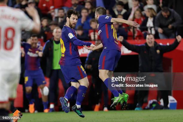 Lionel Messi of FC Barcelona celebrates 2-2 with Jordi Alba of FC Barcelona during the La Liga Santander match between Sevilla v FC Barcelona at the...