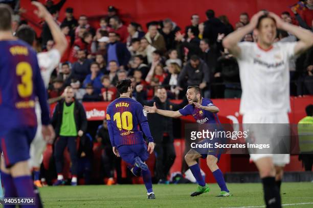 Lionel Messi of FC Barcelona celebrates 2-2 with Jordi Alba of FC Barcelona during the La Liga Santander match between Sevilla v FC Barcelona at the...