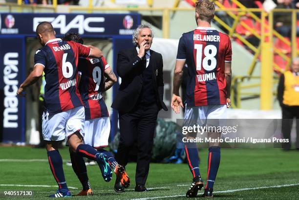 Roberto Donadoni head coach of Bologna FC talks to his players during the serie A match between Bologna FC and AS Roma at Stadio Renato Dall'Ara on...