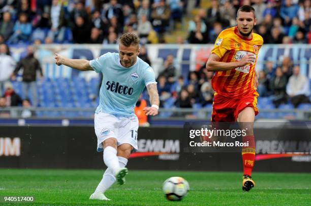 Ciro Immobile of SS Lazio scores the opening goal during the serie A match between SS Lazio and Benevento Calcio at Stadio Olimpico on March 31, 2018...