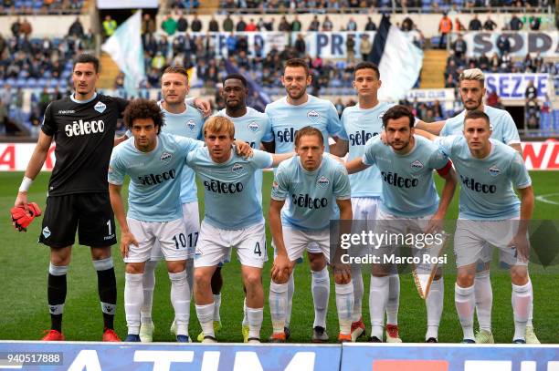 Lazio players pose a photo team before the serie A match between SS Lazio and Benevento Calcio at Stadio Olimpico on March 31, 2018 in Rome, Italy.