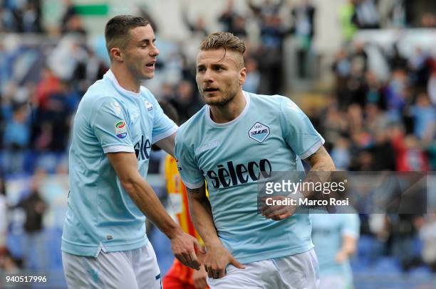 Ciro Immobile of SS Lazio celebrates the opening goal during the serie A match between SS Lazio and Benevento Calcio at Stadio Olimpico on March 31,...