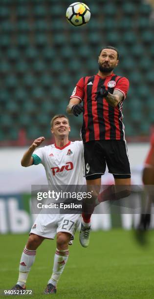 Bodul Darko of FC Amkar Perm vies for the ball with Igor Denisov of FC Lokomotiv Moscow during the Russian Premier League match between FC Amkar Perm...