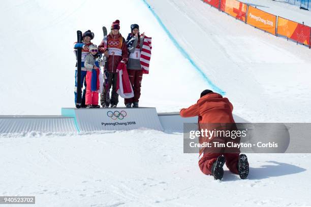 Marie Martinod of France after winning the silver medal with daughter Meli Rose along with gold medalist Cassie Sharpe of Canada and bronze medalist...