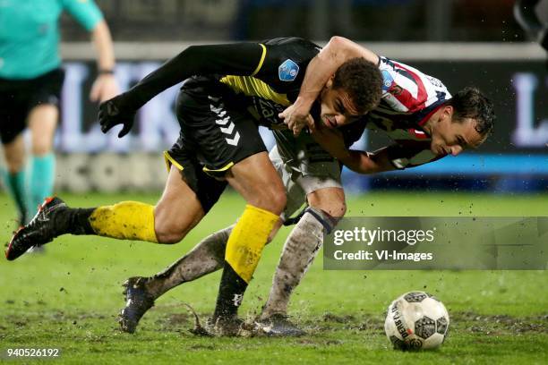 Cyriel Dessers of FC Utrecht, Freek Heerkens of Willem II during the Dutch Eredivisie match between Willem II Tilburg and FC Utrecht at Koning Willem...