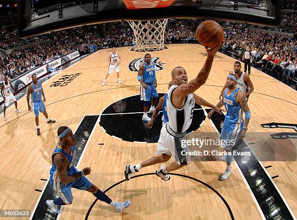 Tony Parker of the San Antonio Spurs shoots against the Denver Nuggets on December 5, 2009 at the AT&T Center in San Antonio, Texas. NOTE TO USER:...