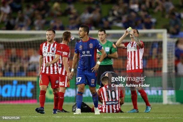 Dario Vidosic of Melbourne City is attended to during the round 25 A-League match between the Newcastle Jets and Melbourne City at McDonald Jones...