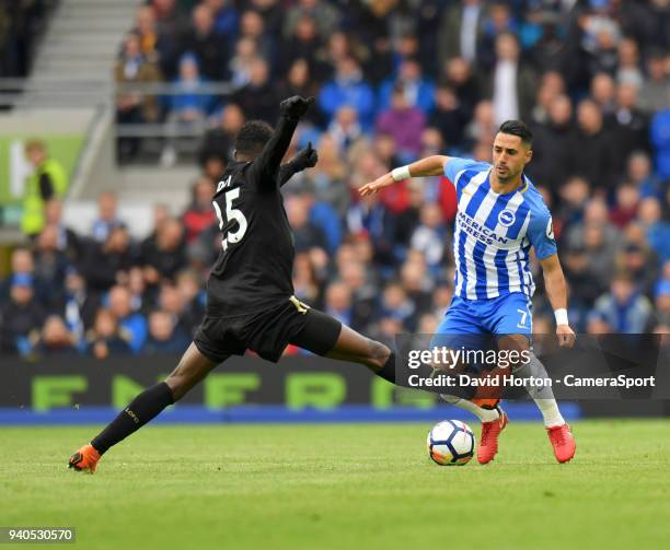 Leicester City's Wilfred Ndidi vies for possession with Brighton & Hove Albion's Beram Kayal during the Premier League match between Brighton and...