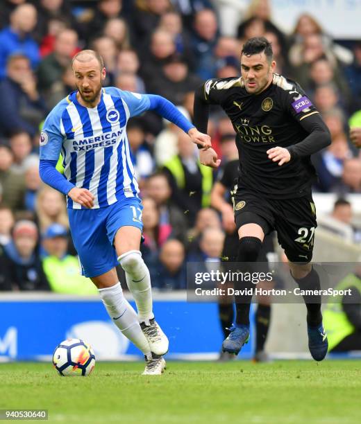 Brighton & Hove Albion's Glenn Murray vies for possession with Leicester City's Vicente Iborra during the Premier League match between Brighton and...