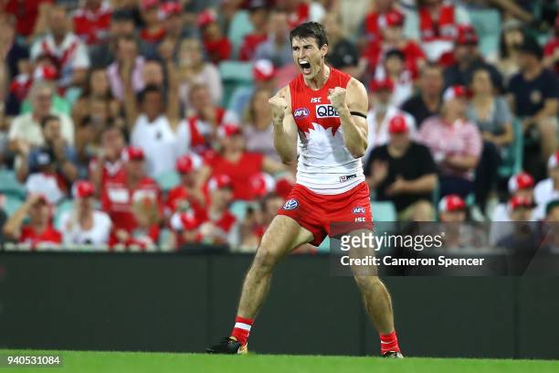 Dean Towers of the Swans celebrates kicking a goal during the round two AFL match between the Sydney Swans and the Port Adelaide Power at the Sydney...