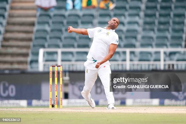 South African bowler Vernon Philander bowls on Australian batsman Tim Pain on the third day of the fourth Test cricket match between South Africa and...