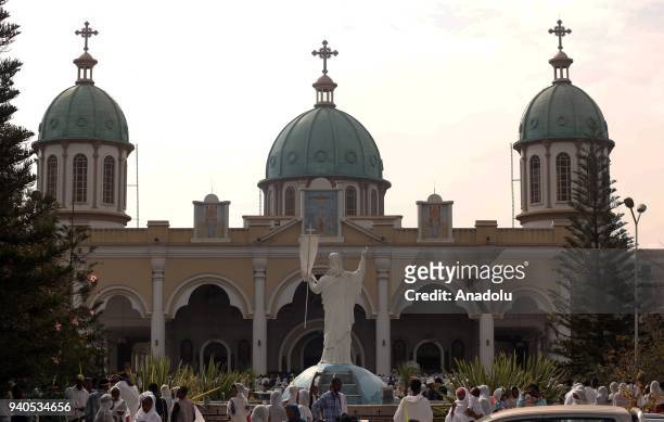 Ethiopian Orthodox Christians gather to attend the Hosanna Day celebrations ahead of the Easter, at the Bole Medehanialem Church in Addis Ababa,...