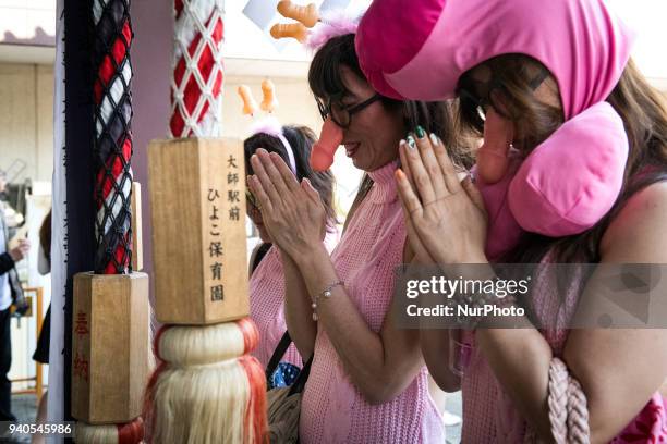 People pray at the shrine for good health during the annual Kanamara Festival at Kanayama Shrine in Kawasaki on April 1 Kawasaki, Japan. The...