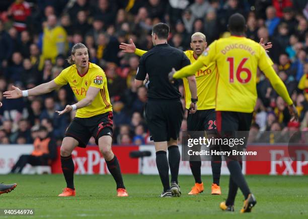 Sebastian Prodl and Etienne Capoue of Watford appeal to the referee during the Premier League match between Watford and AFC Bournemouth at Vicarage...