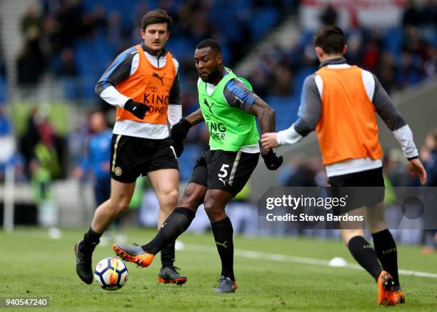 Wes Morgan of Leicester City warms up prior to the Premier League match between Brighton and Hove Albion and Leicester City at Amex Stadium on March...