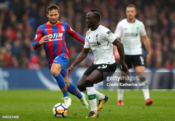 Yohan Cabaye of Crystal Palace and Sadio Mane of Liverpool in action during the Premier League match between Crystal Palace and Liverpool at Selhurst...