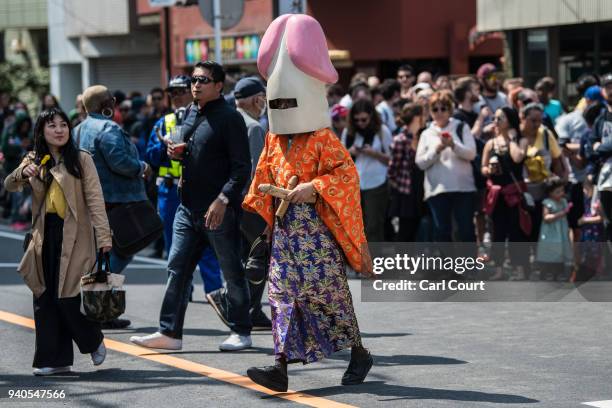 Man wear a phallic-shaped hat during Kanamara Matsuri on April 1, 2018 in Kawasaki, Japan. The Kanamara Festival is held annually on the first Sunday...