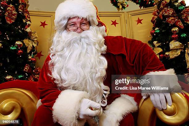 Twenty year veteran children's entertainer and actor Phil Cale poses on his Santa throne at Stanhope Gardens Shopping Centre on December 6, 2009 in...