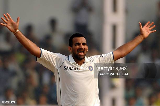 Indian cricketer Zaheer Khan celebrates taking a wicket on the final day of the third Test between India and Sri Lanka in Mumbai on December 6, 2009....