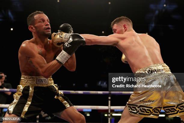 Ryan Burnett punches Yonfrez Parejo during there WBA Bantamweight Championship title fight at Principality Stadium on March 31, 2018 in Cardiff,...