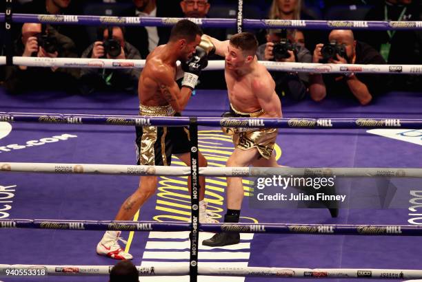 Ryan Burnett punches Yonfrez Parejo during there WBA Bantamweight Championship title fight at Principality Stadium on March 31, 2018 in Cardiff,...