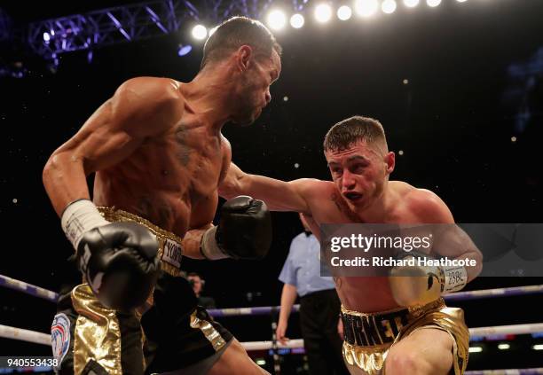 Ryan Burnett punches Yonfrez Parejo during there WBA Bantamweight Championship title fight at Principality Stadium on March 31, 2018 in Cardiff,...