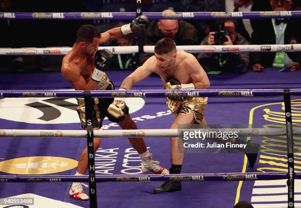 Ryan Burnett punches Yonfrez Parejo during there WBA Bantamweight Championship title fight at Principality Stadium on March 31, 2018 in Cardiff,...