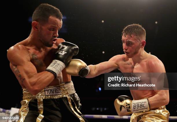 Ryan Burnett punches Yonfrez Parejo during there WBA Bantamweight Championship title fight at Principality Stadium on March 31, 2018 in Cardiff,...