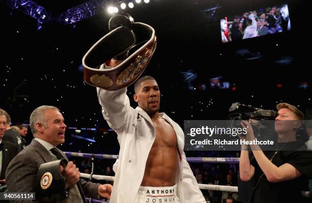 Anthony Joshua celebrates victory after his WBA, IBF, WBO & IBO Heavyweight Championship title fight against Joseph Parker at Principality Stadium on...