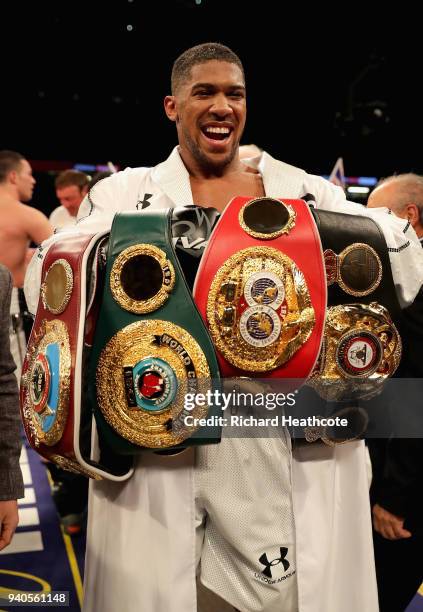 Anthony Joshua celebrates victory after his WBA, IBF, WBO & IBO Heavyweight Championship title fight against Joseph Parker at Principality Stadium on...