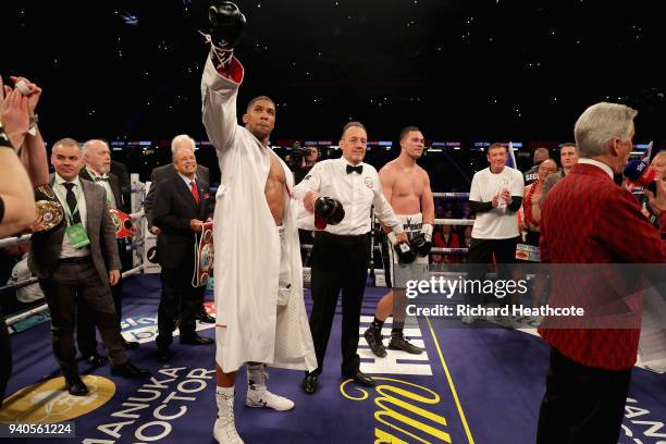 Anthony Joshua celebrates victory after his WBA, IBF, WBO & IBO Heavyweight Championship title fight against Joseph Parker at Principality Stadium on...