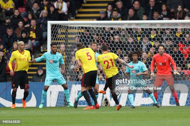 Kiko Femenia of Watford scores his sides first goal during the Premier League match between Watford and AFC Bournemouth at Vicarage Road on March 31,...