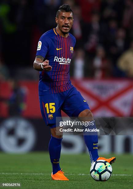 Paulinho of FC Barcelona in action during the La Liga match between Sevilla CF and FC Barcelona at Estadio Ramon Sanchez Pizjuan on March 31, 2018 in...