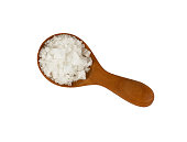 Wooden spoon of white Cyprian pyramid sea salt