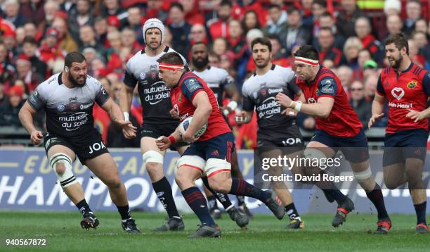 Stander of Munster breaks with the ball during the European Rugby Champions Cup match between Munster Rugby and RC Toulon at Thomond Park on March...