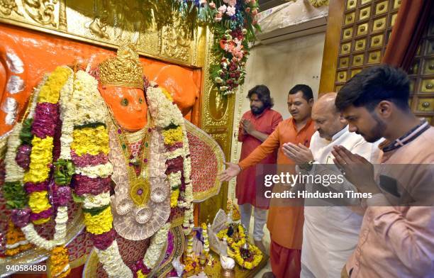 People visit temple to offer prayers on the occasion of Hanuman Jayanti at the Hanuman temple near Link Road, on March 31, 2018 in New Delhi, India....
